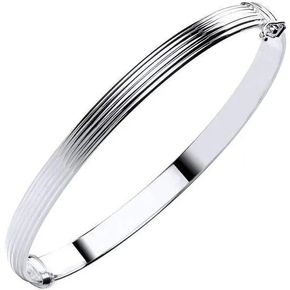 9K White Gold Hollow Ribbed Ladies Hinged Bangle
