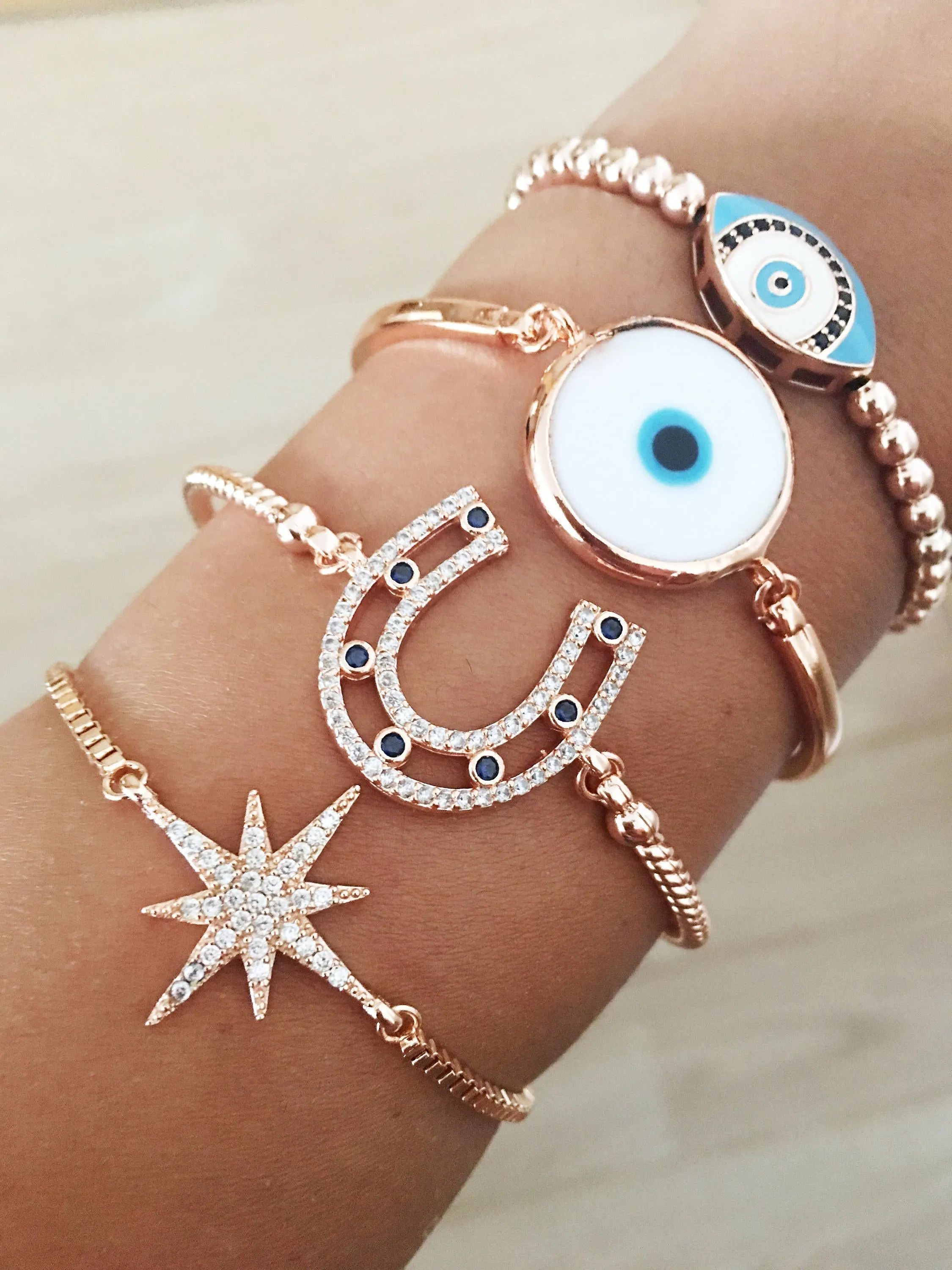 Adjustable Evil Eye Bracelet with Horseshoe, Murano Glass, and Star Charms