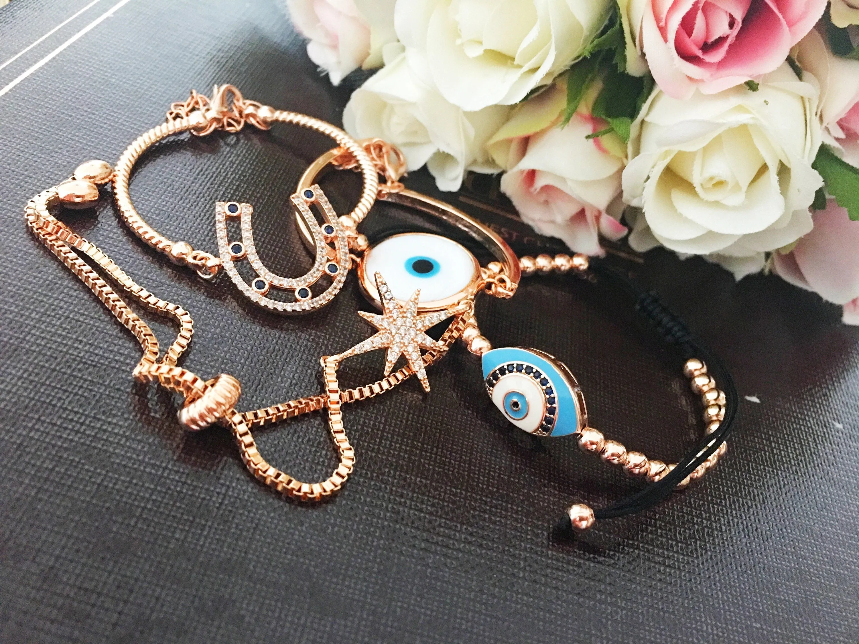 Adjustable Evil Eye Bracelet with Horseshoe, Murano Glass, and Star Charms