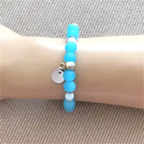 Blue Opaque Glass Stretch Bracelet with Silver Disc