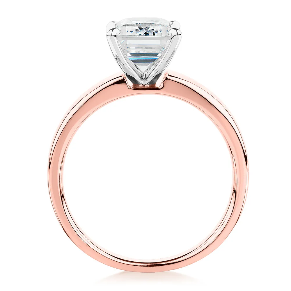 Emerald Cut solitaire engagement ring with 3.01 carat* diamond simulant in 14 carat rose and white gold