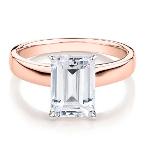 Emerald Cut solitaire engagement ring with 3.01 carat* diamond simulant in 14 carat rose and white gold