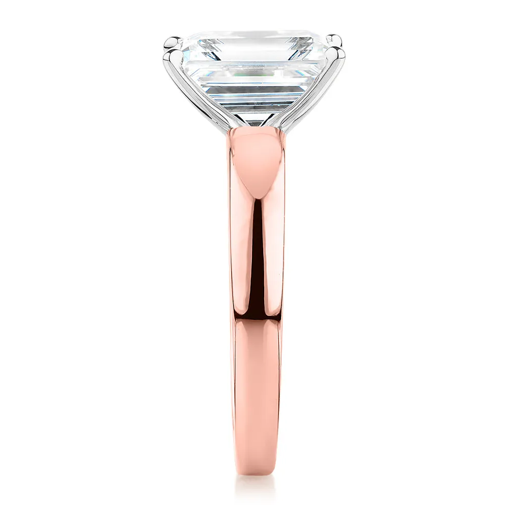 Emerald Cut solitaire engagement ring with 3.01 carat* diamond simulant in 14 carat rose and white gold