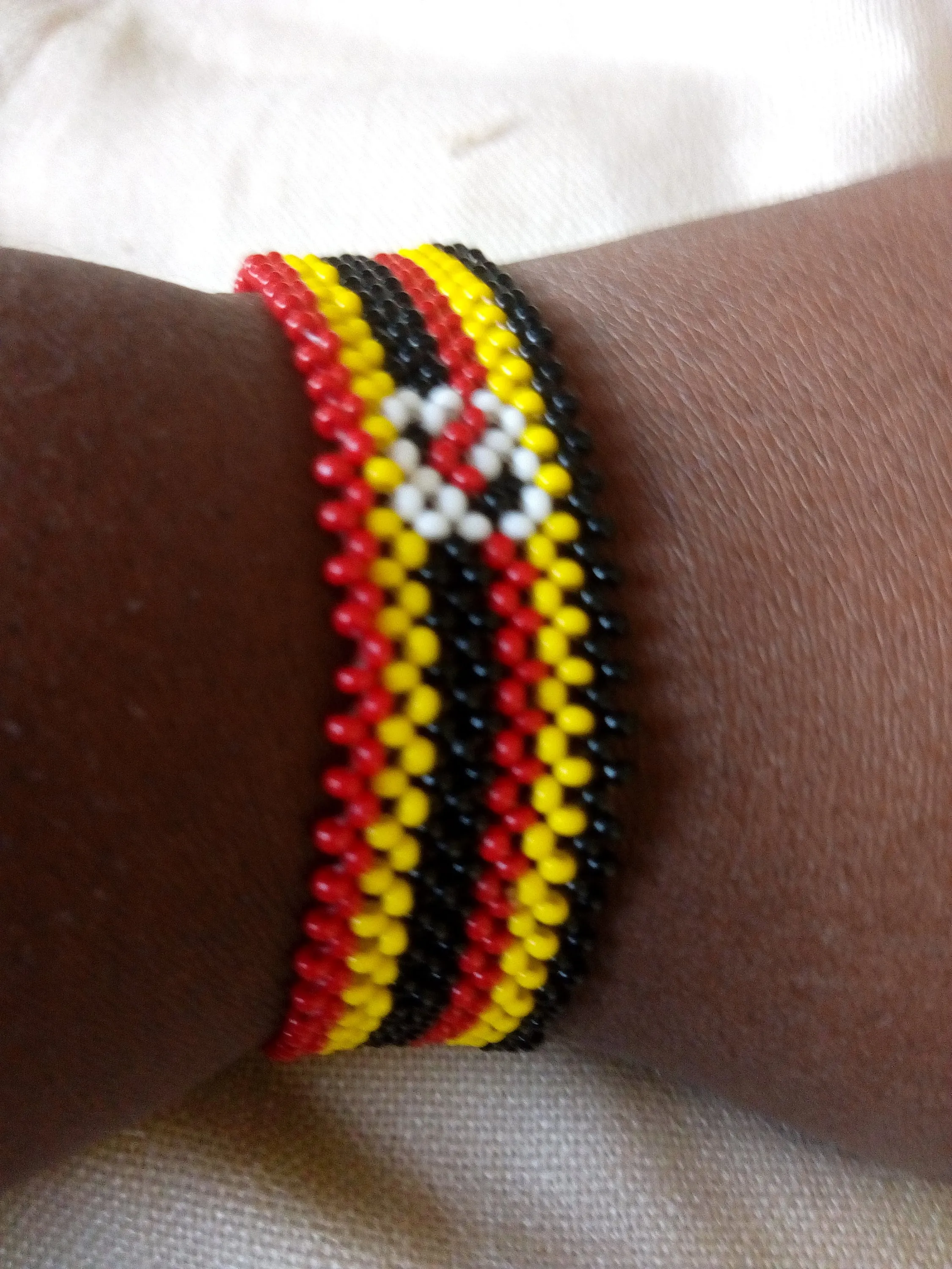 Ugadan flag beaded bracelets made in Kenya by the masaai/maasai/masai community