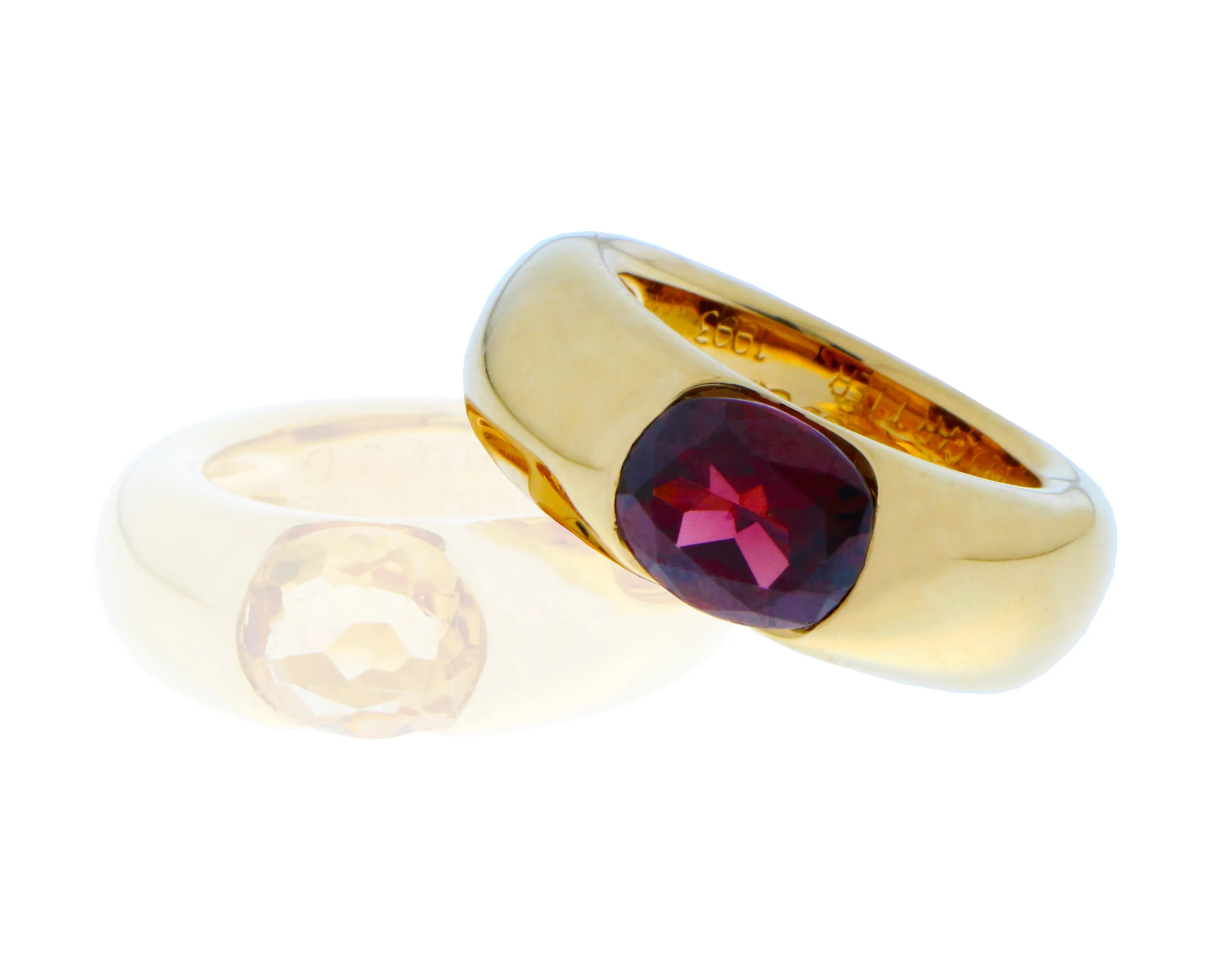 Yellow gold Cartier ‘Ellipse’ ring with citrine or garnet. Price per ring